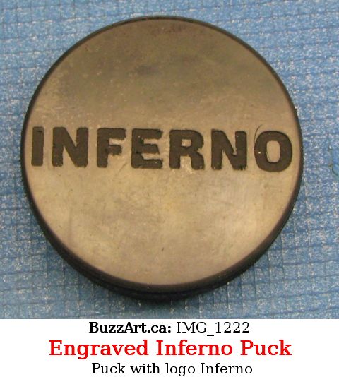 Team Inferno engraved on hockey puck - not good for playing with as to deep engraving